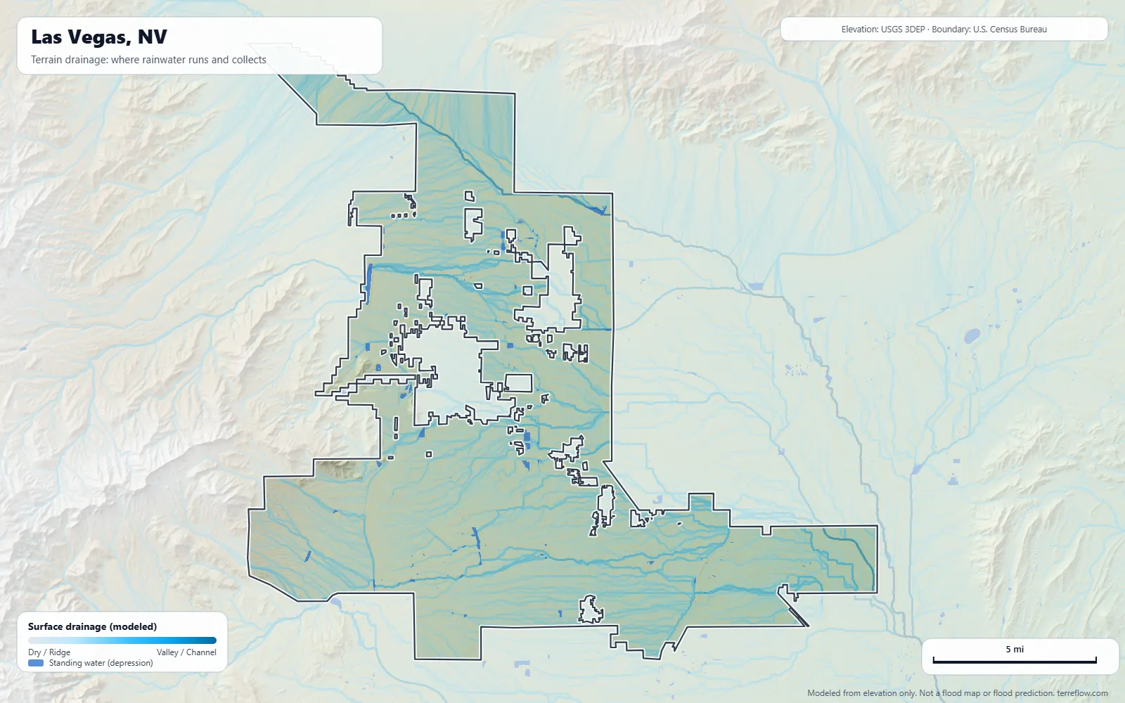 Terrain drainage map of Las Vegas, NV: modeled paths where rainwater runs and collects, from USGS 3DEP elevation data, with the city boundary
